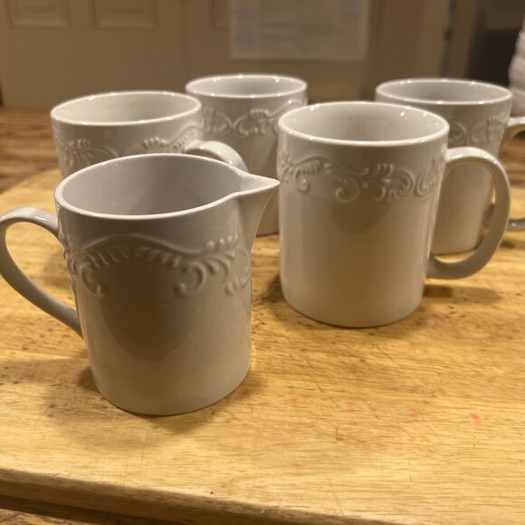 5-Piece Pfaltzgraff Charlotte Meridian Embossed White 4 Mugs + Creamer EXCELLENT - Picture 1 of 9
